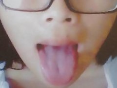 asian cutie with a tongue full of cum