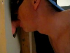 Hot sucking action at the homemade glory hole 3