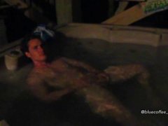 hot man in a hot tub