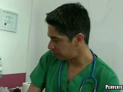 Horny doctor tugging on his patients stiff prick