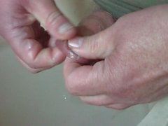 Foreskin washing in a bowl