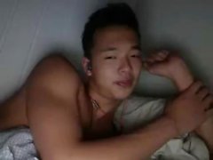 Asian masturbating
