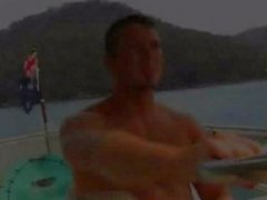 The muscled Australian men fuck on the bow of a ship.