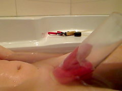 Pumping my cock and fuckin my ass in the bathtub