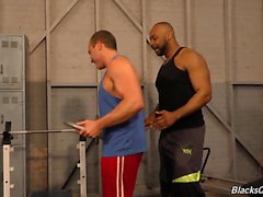Muscular white guy goes black in a gym